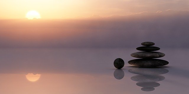 Sunset with balanced stones